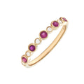 Anillo Redondo con Piedra de Color en Bisel y Diamantes en Oro Amarillo 14k