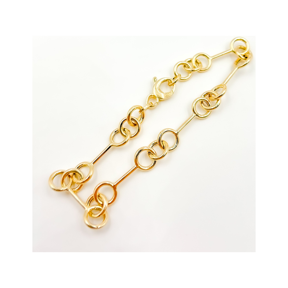 Pulsera Hueca de Barras y Aros en Oro Amarillo 14k - Oro Amarillo